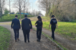 Iain walking with police officers
