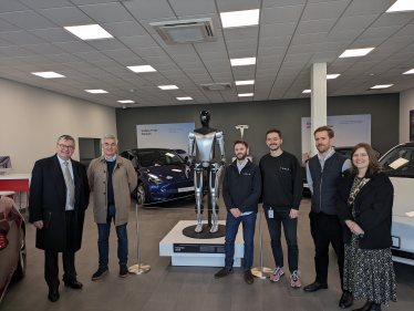 Iain with the team at Tesla