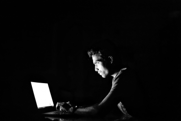 A hacker on a computer